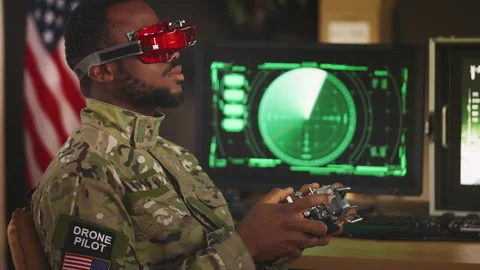 American military drone operator developing piloting skills using FPV system 動画素材 335538908