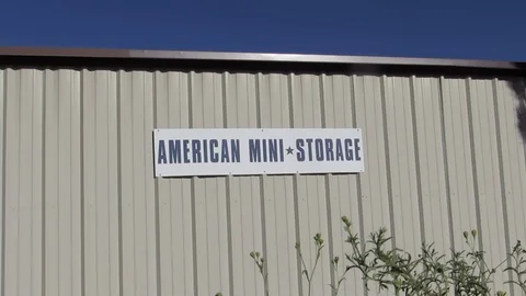 American Mini Storage sign seen near US Route 66 highway in Kingman Arizona Stock Footage 80521623