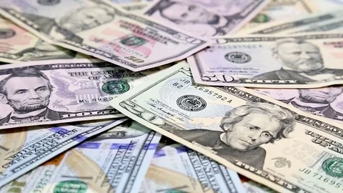 American money dollars on rotating surface background. Stock Footage 71980366