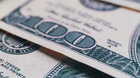 American Money Dollars on Rotating Surface Background Stock Footage 73755235
