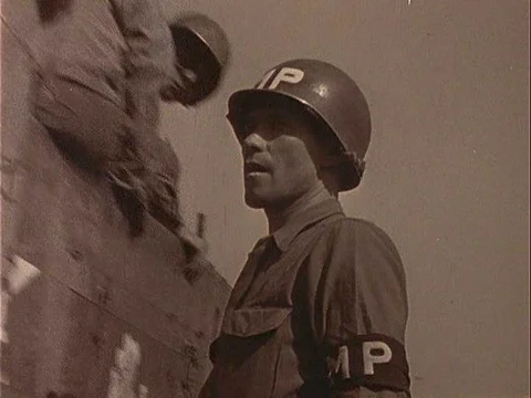American MP's help army tanks ford rivers in Vietnam in 1976. Video stock 75756784