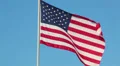 American national flag waving on blue sky background HD Footage