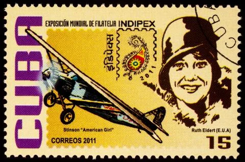 American pilot Ruth Elder and her airplane Stinson 'American Girl' on postage Stock Photos