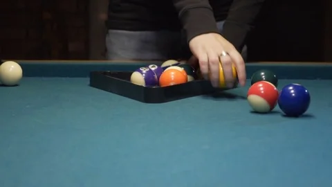 American Pool, creating billiard pyramid. 120fps Stock Footage 83659655