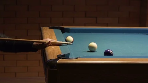 American Pool, young man is aiming to hit the cue ball Video stock 83098955