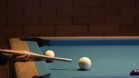 American Pool, young man is aiming to hit the cue ball Video stock 83657568