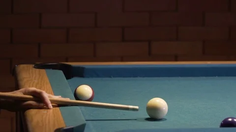 American Pool, young man is aiming to hit the cue ball Video stock 83658449