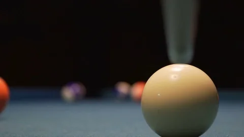 American Pool, young man is aiming to hit the ball in the pocket Stock Footage 83665532