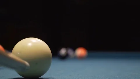 American Pool, young man is aiming to hit the ball in the pocket Stock Footage 83665871