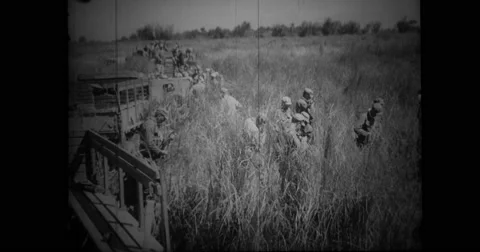 American POW's cleaning weapons during break Stock Footage 43502960