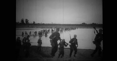 American POW's wading through river after being freed in Philippines Stock Footage 43502959