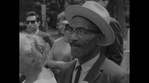 American protester smoking during Civil Rights March Stock Footage