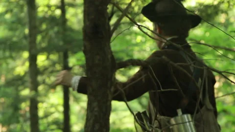 American Rev War Re-enactor Commands and waits in Wilderness for Battle Stock Footage 170389902