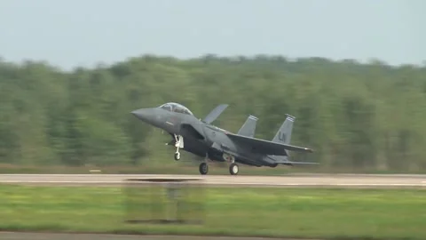 American supersonic fighter fourth generation F-15 "Eagle" lands on runway. Stock Footage 197779932