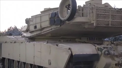 American Tanks Roll By on Train Stock Footage 236960518