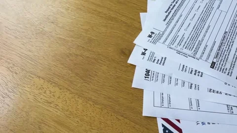 American Tax Paperwork on table Stock Footage 265310103