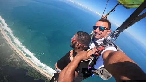 An American tourist make skydiving with the Instructor Stock Footage 204757204