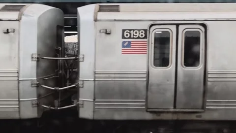 American train passing at high speed in a neighborhood Stock Footage 136202950