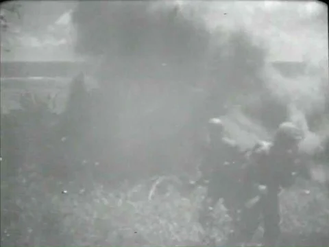As American troops fight against the enemy, Japanese soldiers surrender or Stock Footage 75752987