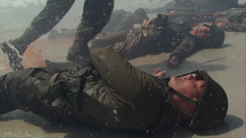 American troops storming Normandy on beach, World War II - Reenactment Stock Footage 202892287