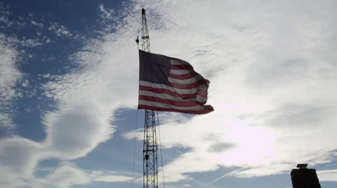 American_flag_crane_cloudy_sky Video stock 40647226