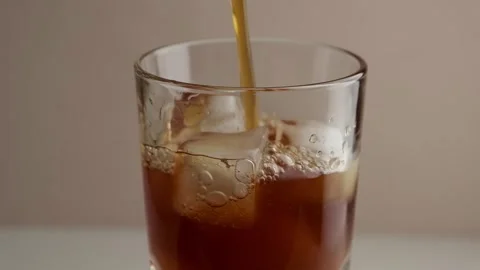 Americano Iced coffee on the table. Slow motion. Rotation. Stock Footage 280900867