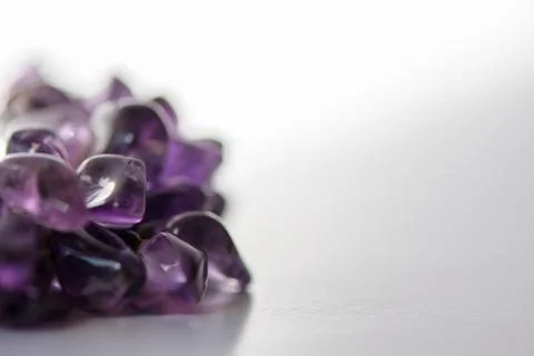 Amethyst crystals on white background. Stock Photos
