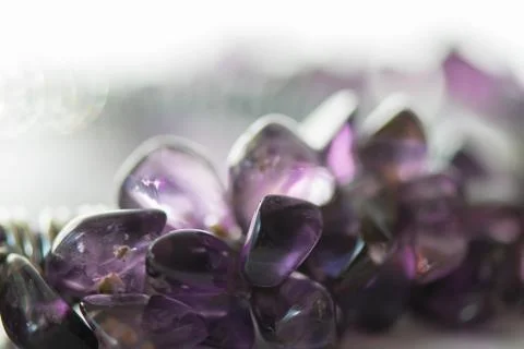 Amethyst crystals on white background. Stock Photos