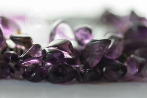 Amethyst crystals on white background. Stock Photos
