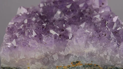 Amethyst Dolly on Gray Background Stock Footage 29269623