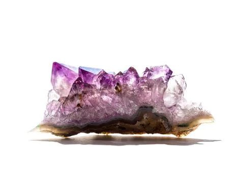 Amethyst gemstone on a white background Stock Photos