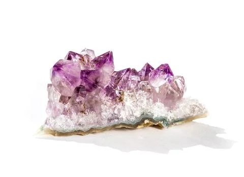 Amethyst gemstone on a white background Stock Photos