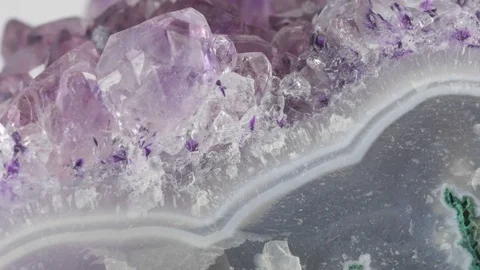 Amethyst geode crystals on gemstone. Extreme close up macro shot with sliding. Stock Footage 74094804