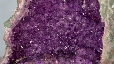 Amethyst Geode Interior Rich With Purple Crystals Close Up Stockbeeldmateriaal 332824756