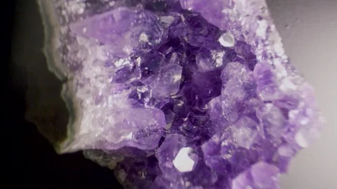An amethyst geode rotating view under stereo microscope Stock Footage 346431920