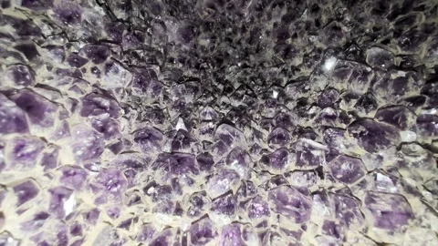 Amethyst geode at the Wanda mines in Misiones, Argentina. Amethysts sparkle in a Stock Footage 328427907