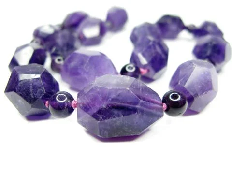 Amethyst semigem beads Stock Photos