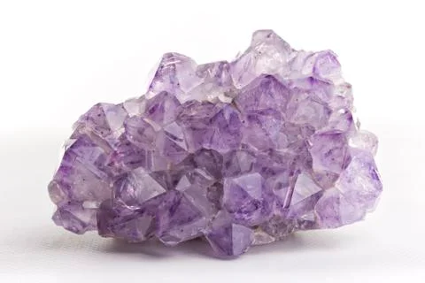 Amethyst on white background. Stock Photos