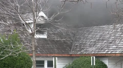 Amid the Force of Nature - House Fire Inside Sends Black Smoke Outside Video stock 10889419