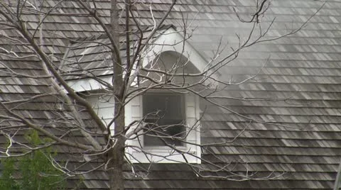 Amid the Force of Nature - Smoking Dormer from Internal House Fire Video stock 10861489