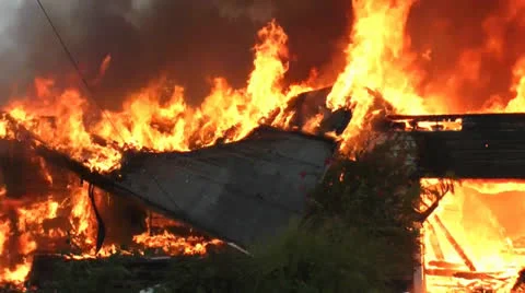 Amid the Forces of Nature - House Fire Disaster Roof Collapse Video stock 26397722