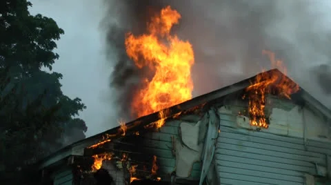 Amid the Forces of Nature - House Fire - Inferno Shoots Through the Roof Video stock 26397901