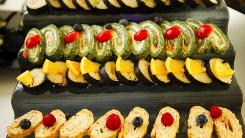 Amlet rolls with spinach and salmon. A dish of Japanese cuisine. Stock Footage 145706933