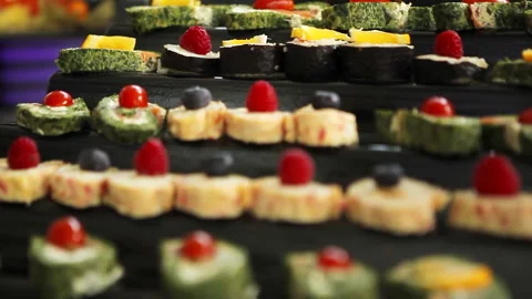 Amlet rolls with spinach and salmon. A dish of Japanese cuisine. Sushi rolls Stock Footage 145706949