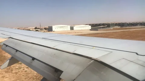 Amman, Jordan - Plane landing at the airport Stock Footage