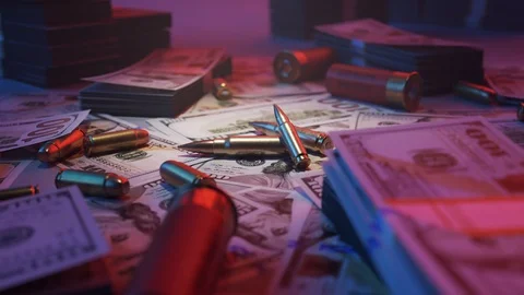 Ammo bullets in the middle of mafia table stacked with cash. Neon lights. 4KHD Stock-Footage 112600050