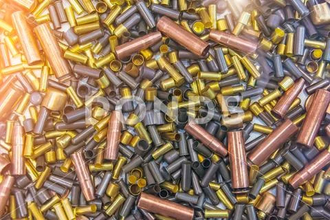 Ammo bullets, military war background. Army supplies texture. Stock Photos