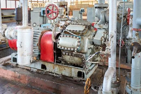 Ammonia refrigerant compressor as interior element of chemical enterprise Stock Photos
