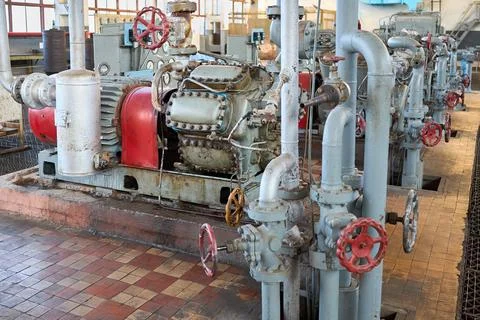 Ammonia refrigerant compressor as interior element of chemical enterprise Stock Photos