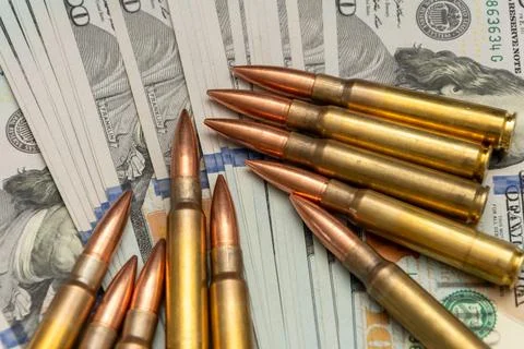 Ammunition and American dollars. The composition emphasises the relationshi.. 写真素材